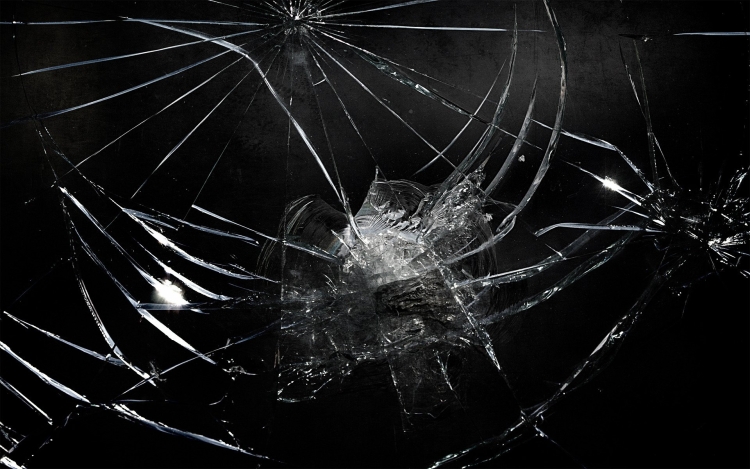 "What steps should be taken in the event of a fractured phone screen and how to handle a situation where the glass on a mobile device has shattered yet the sensor is still functional?"